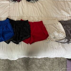 5 pairs Lululemon mid-rise Tracker Shorts size 10